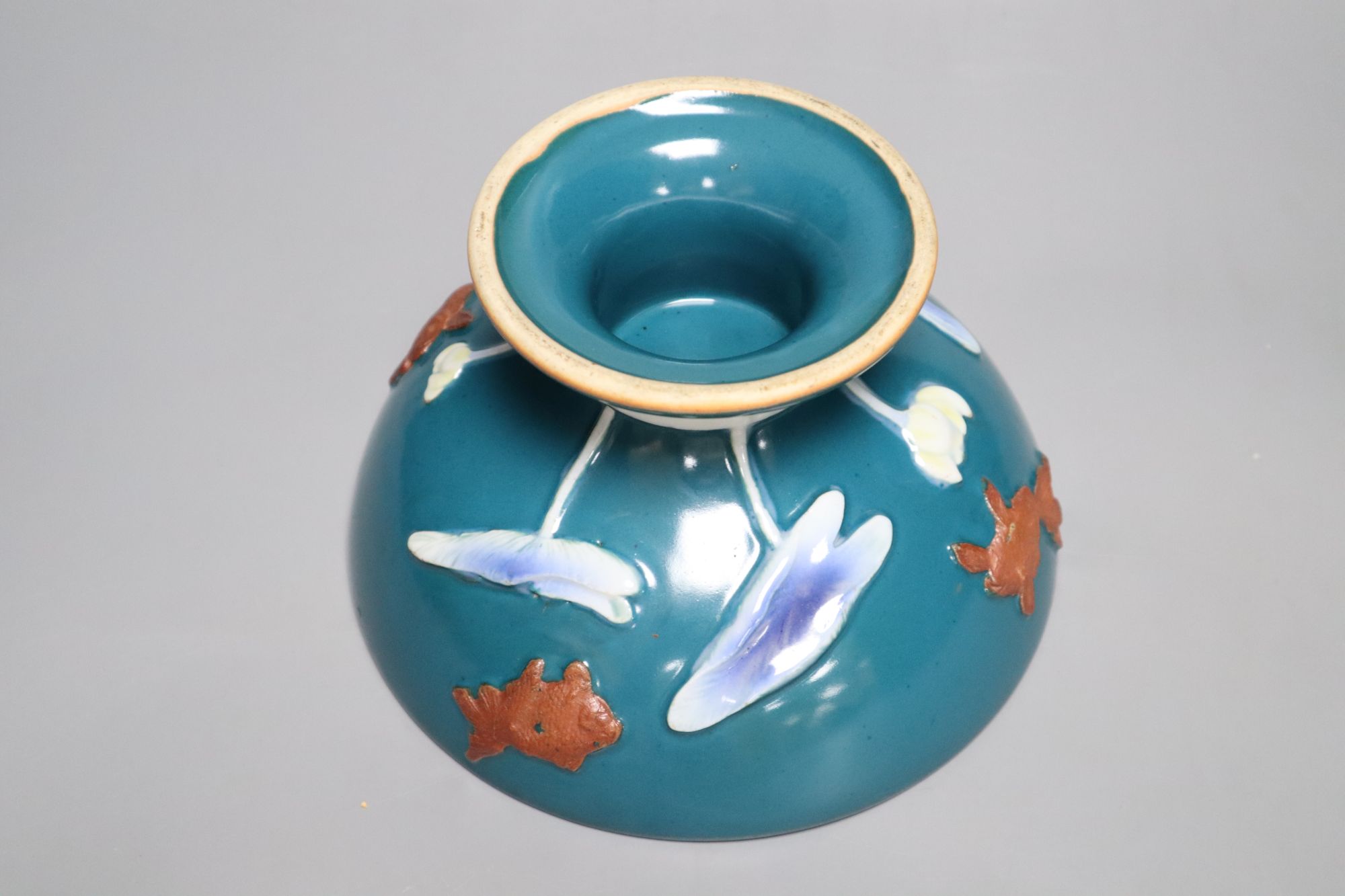 An Asian green glazed lotus pedestal bowl, diameter 22cm height 12.5cm